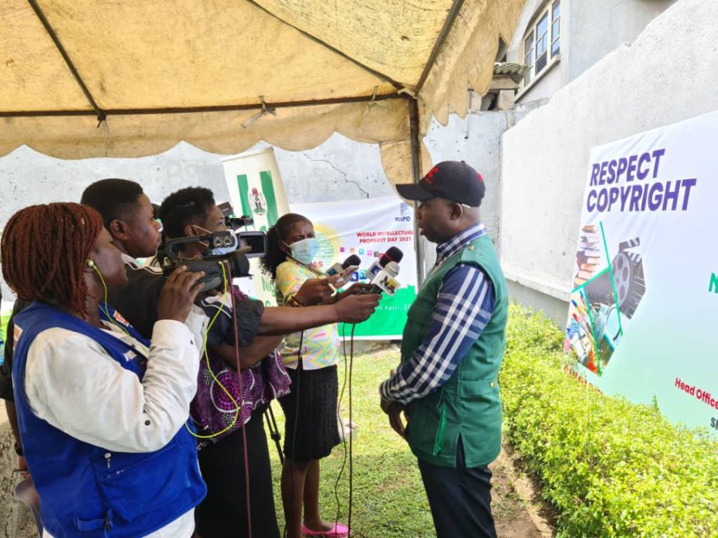 John Assein at a press briefing